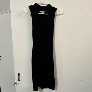Knit Black dress with a small hoop on the front